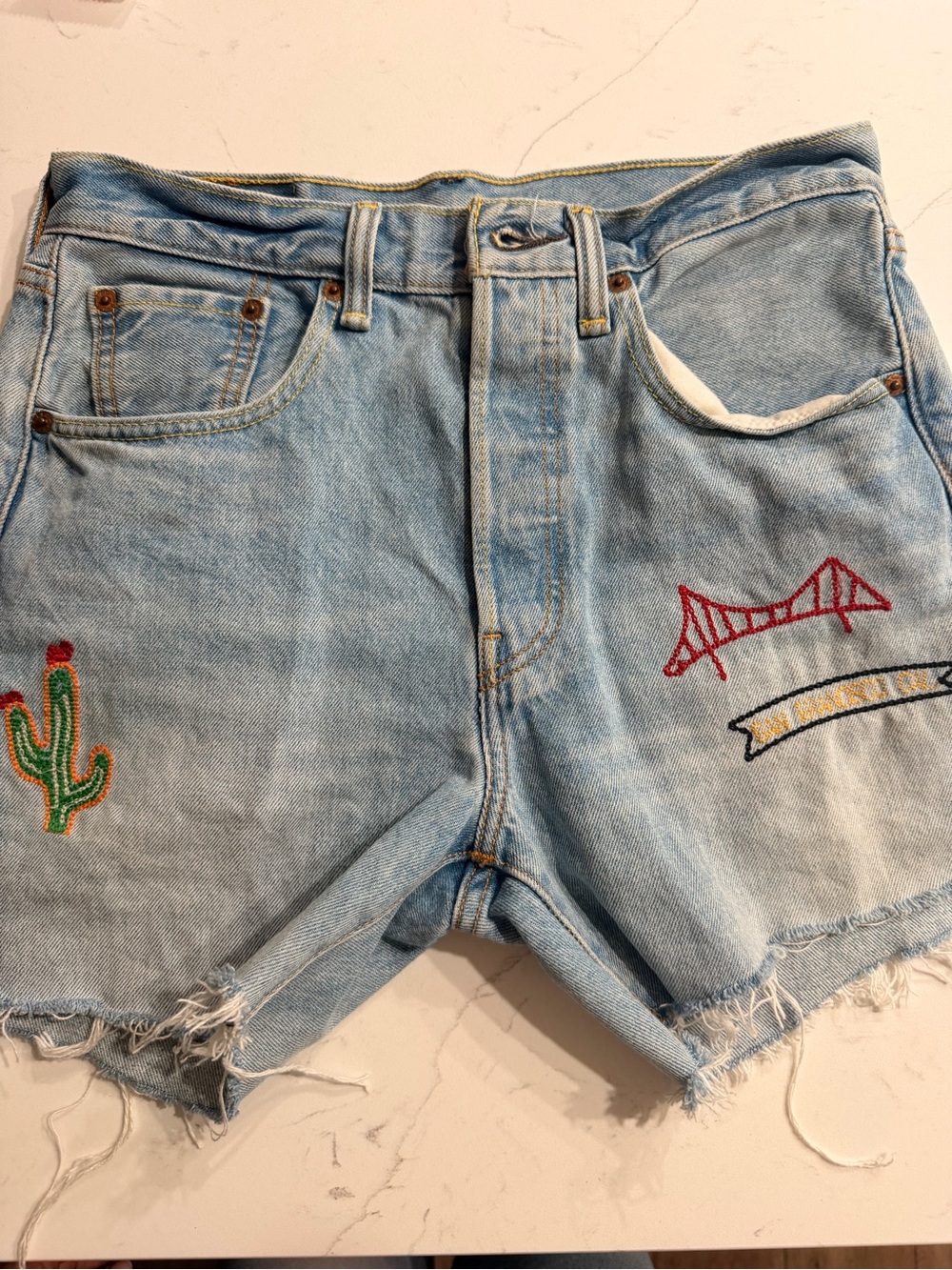 Levi's Light Blue Embroidered Denim Cutoff Shorts
